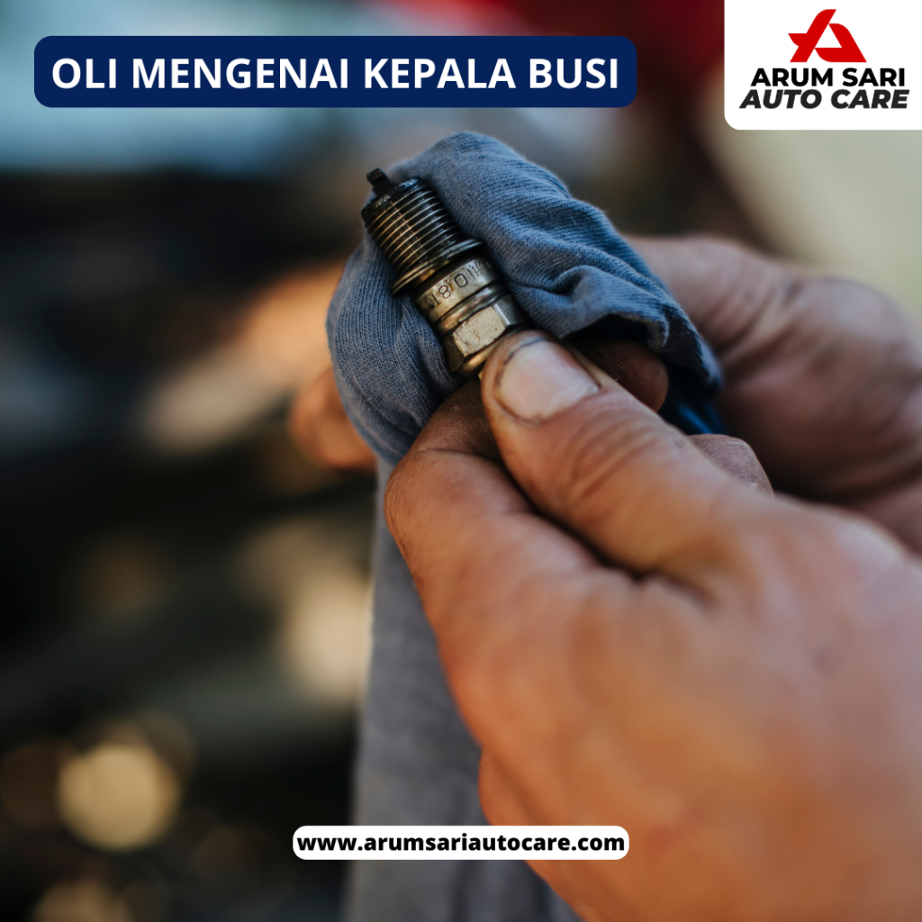 oli mengenai kepala busi turun mesin mobil